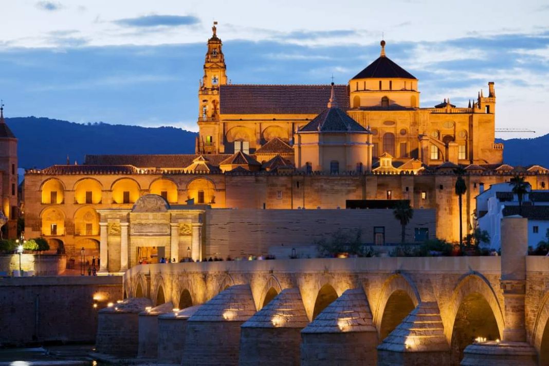 Mezquita Cathedral (The Great Mosque) illuminated at dusk in Cordoba, Andalusia, Spain.